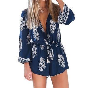 Blue Long sleeve Romper with feather design