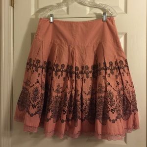 Peach with black floral design