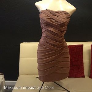 Party dress! Tight fitting, mauve colored dress.