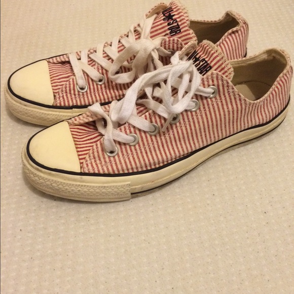 Red and white striped Converse sneaker.