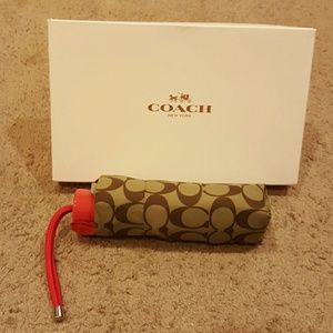 Coach umbrella, new in original  box