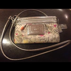 Cute, girly Coach cross body purse!