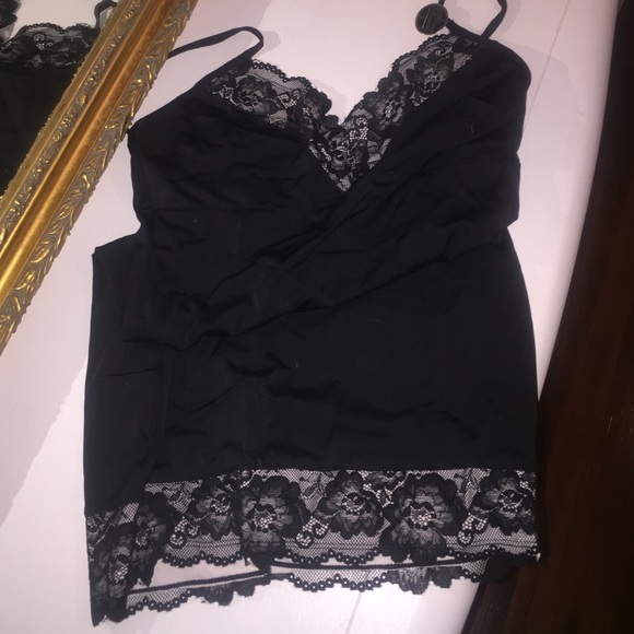New slimming lingerie. Never worn. Runs small.