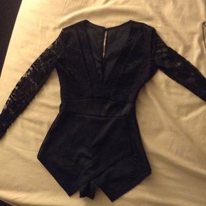 Black Laced long v-neck romper. Size M