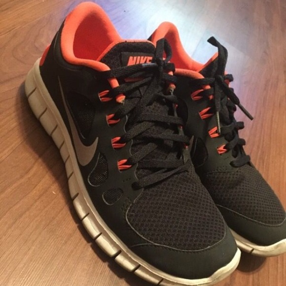 Black/ orange Nike Free 5.0