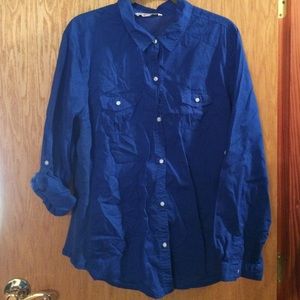 Dark blue button up shirt.