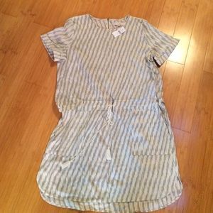 White with black design dress.