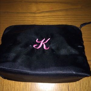 Black makeup bag -includes Sephora glamour guide