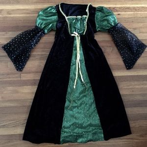Halloween costume for girl. Dress with hat