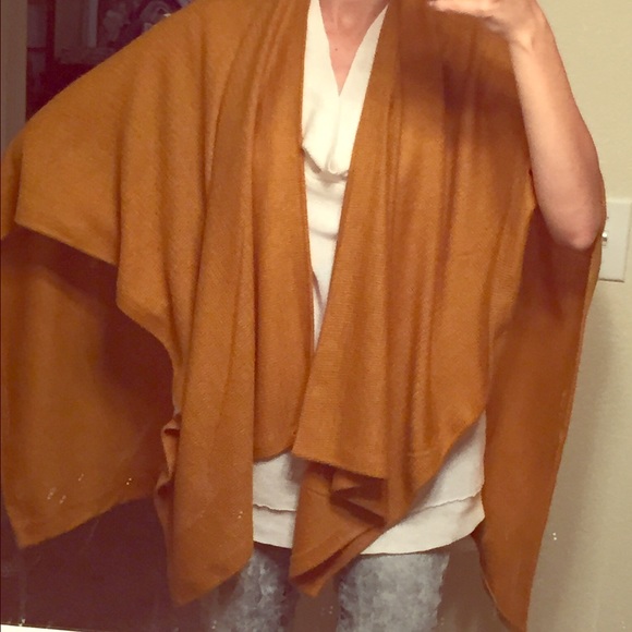 Deep topaz colored knit poncho. Warm but light!