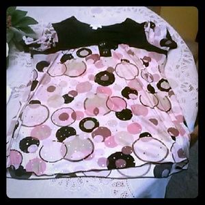 Very pretty dressy shirt! Barley ever wear it!