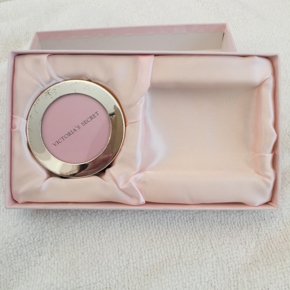 Victoria Secret silver tone frame.