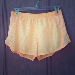 Creamy orange running shorts