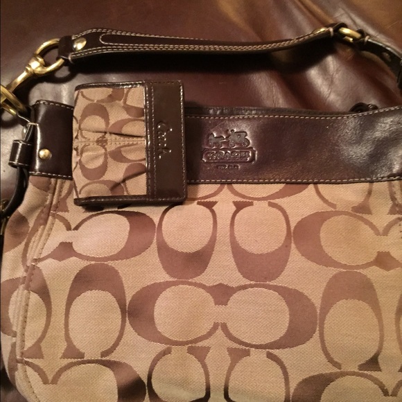 Coach brown tote with wallet.