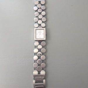 Silver fossil watch