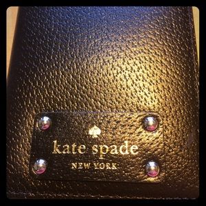 Kate spade black passport holder.
