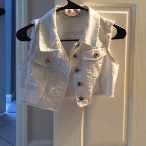 "Crop" white jean vest.