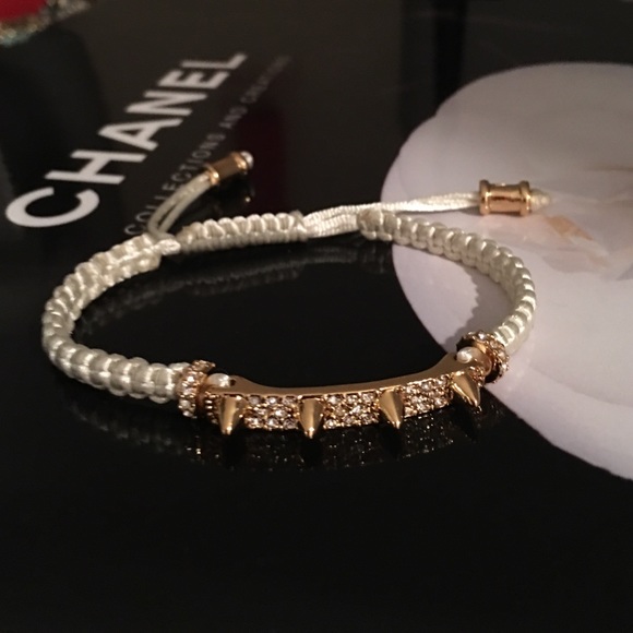 Vince Camuto white and gold spike bracelet