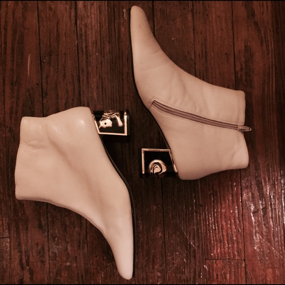 Vintage white leather boots with gold cat heels