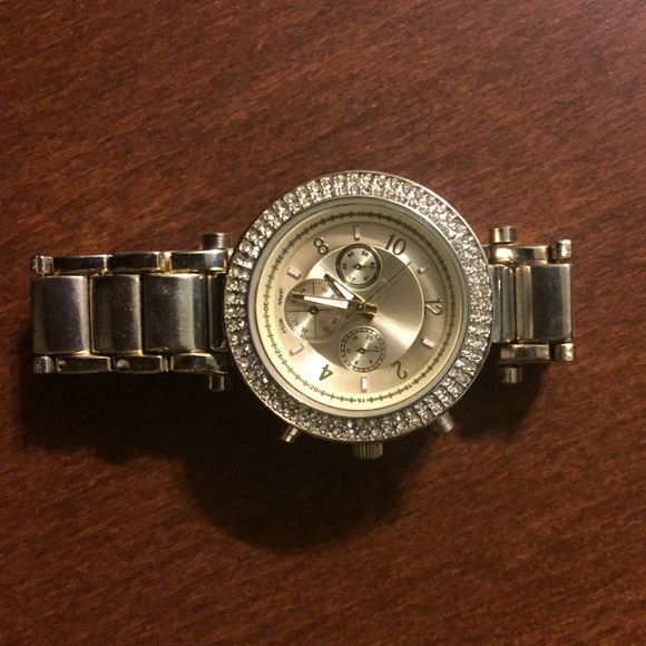 stainless steel gold watch