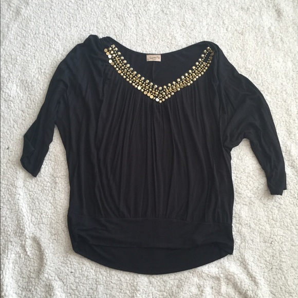 Black V neck with gold embellishment