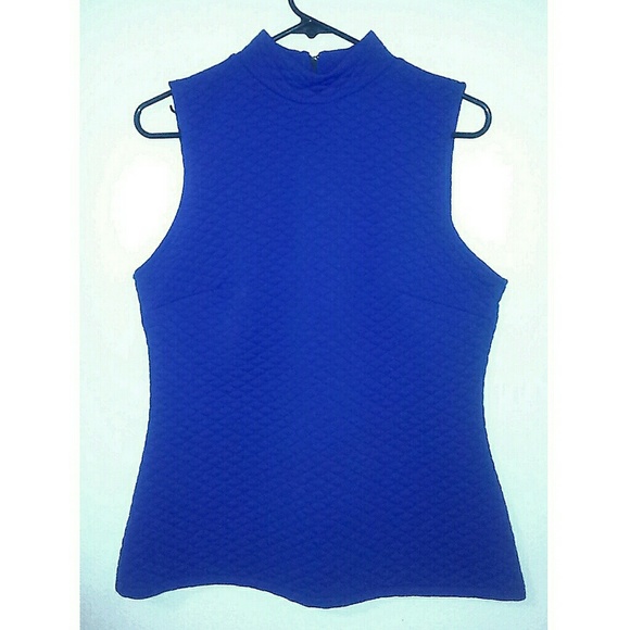 Blue quilted turtleneck top