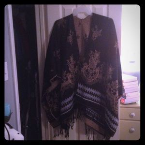 Black/tan & white cape/wrap.