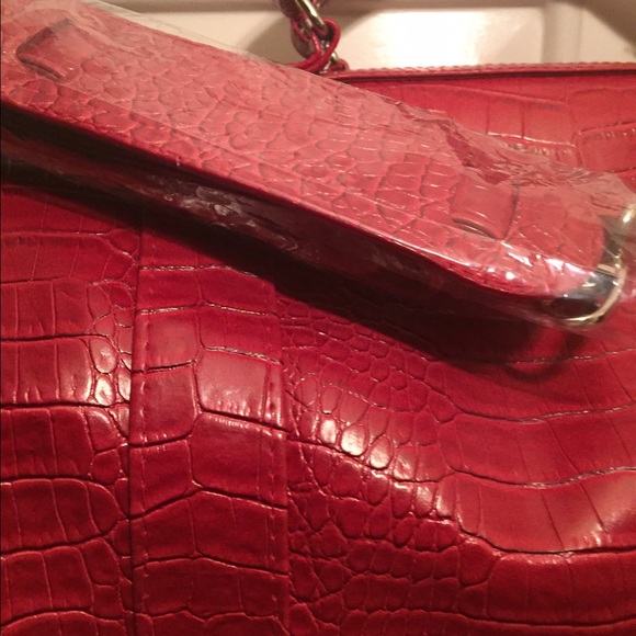 Red leather duffle bags. Brand new.