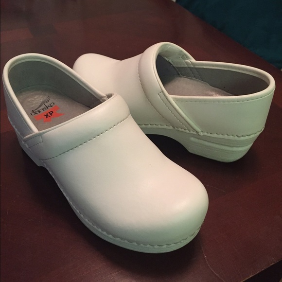 Dansko white leather clogs