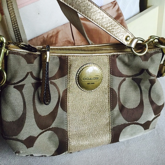 Coach shoulder purse with gold accents