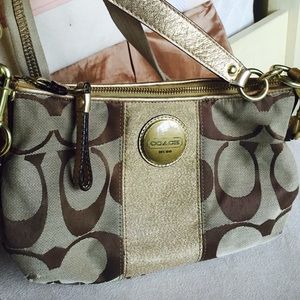Coach shoulder purse with gold accents