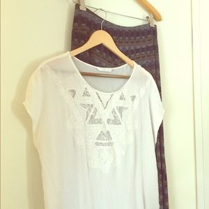 Beachwear boho style pants and flowy white top