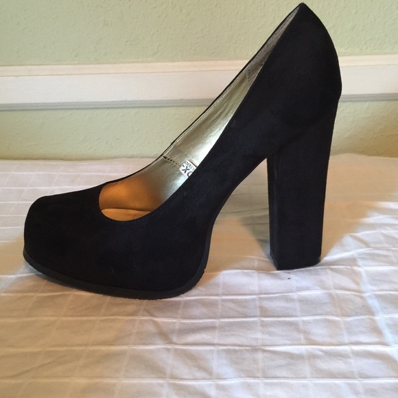 Black faux suede closed toe heels