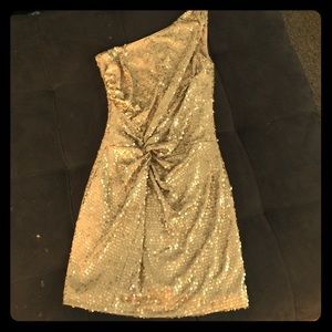 Gold sequined off the shoulder dress