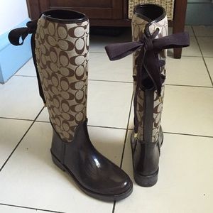 Women's Coach rain boots.
