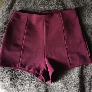 Maroon tap shorts; form fitting
