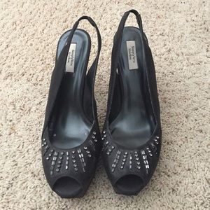 Sling back Vera Wang pumps!