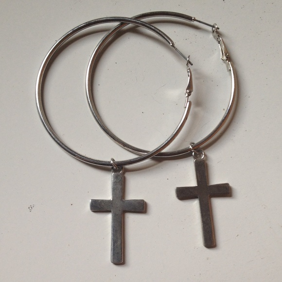 Silver hoop ear rings with dangling crosses