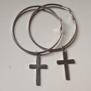 Silver hoop ear rings with dangling crosses