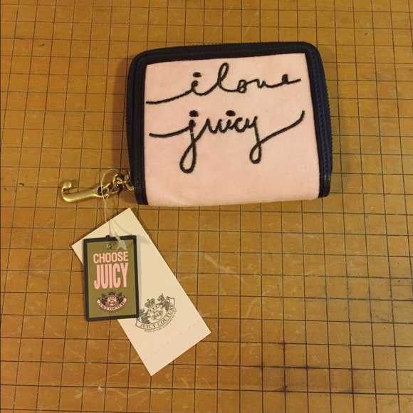 Juicy Couture zip wallet. Brand new. Never used.