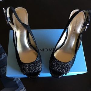 Black sling back pumps with bead embellishments