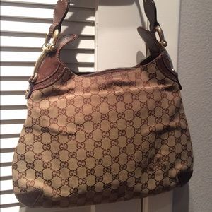 authentic Gucci bag! Well worn hence low price!