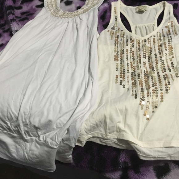 9 different tank tops. Top  white ones are sold
