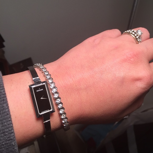 Movado watch: delicate band, black face, box incl.