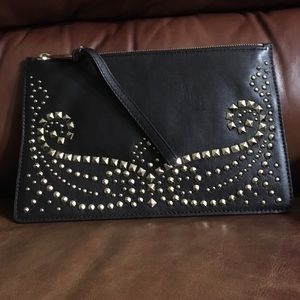 Micheal Kors. Brown Clutch