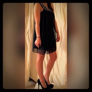 Flowy, with glistening rhinestone that wrap around