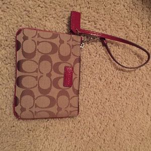 Coach zip wristlet with signature fabric