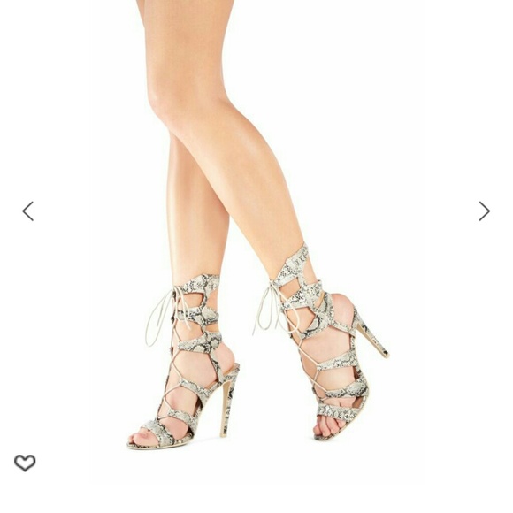 Snakeskin print lace up heels