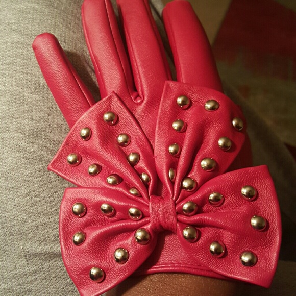 Red studded motorcycle gloves.