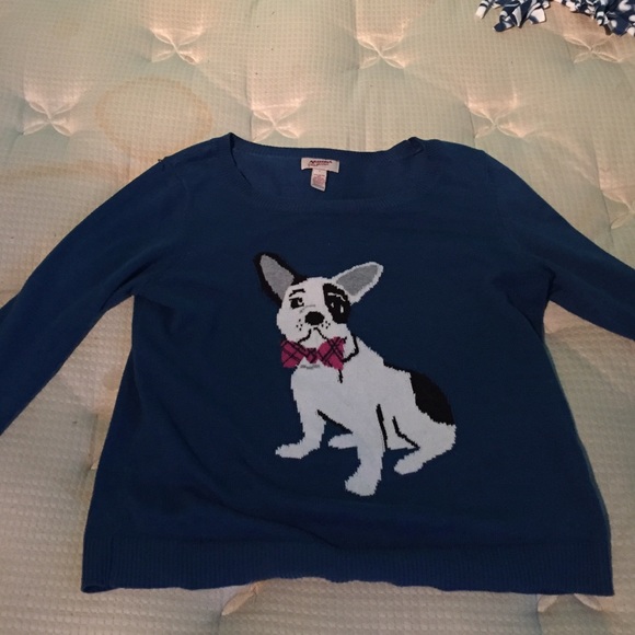 Blue sweater w/ dog.